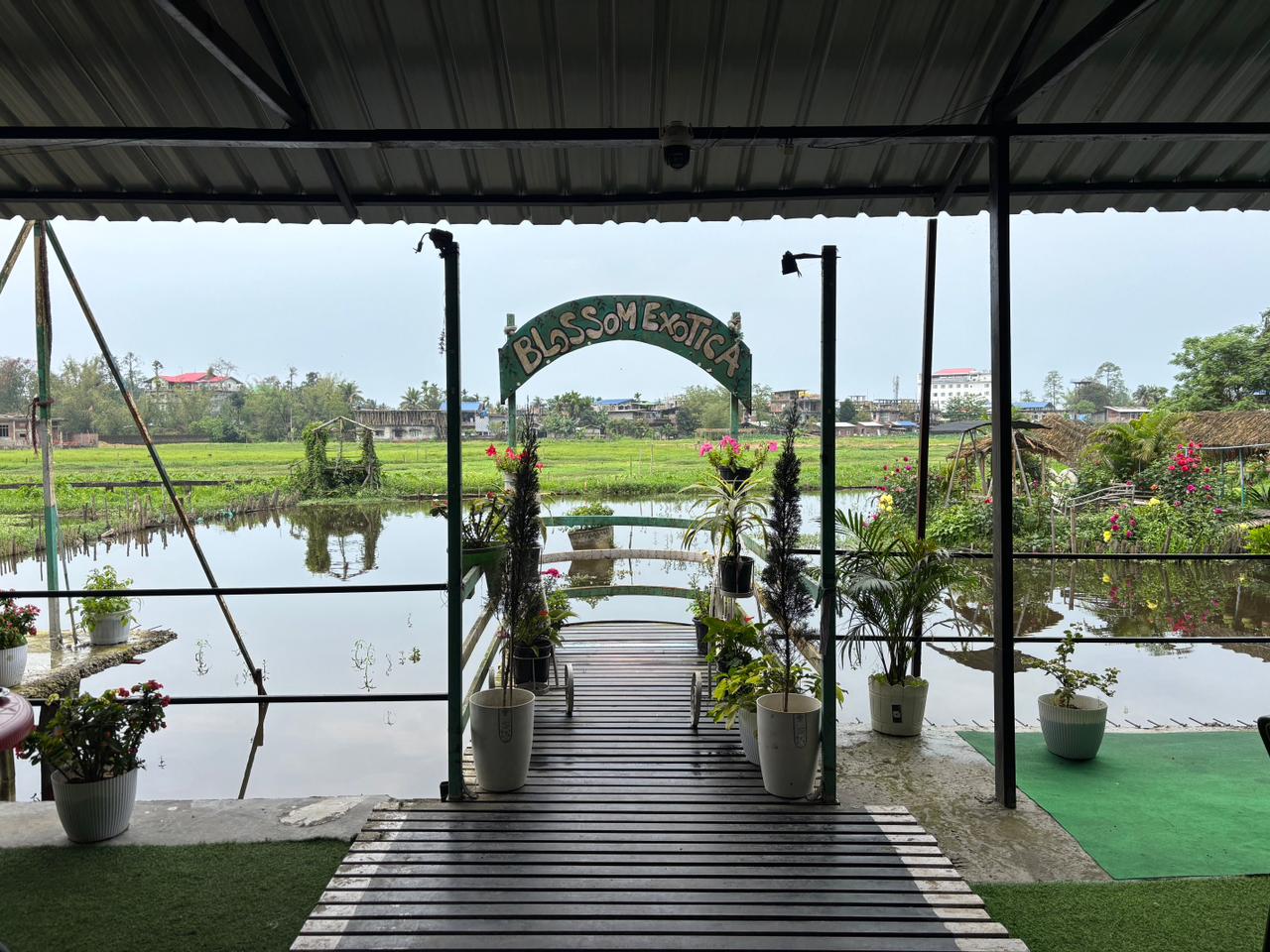 Covered waterfront entrance deck at Blossom Exotica