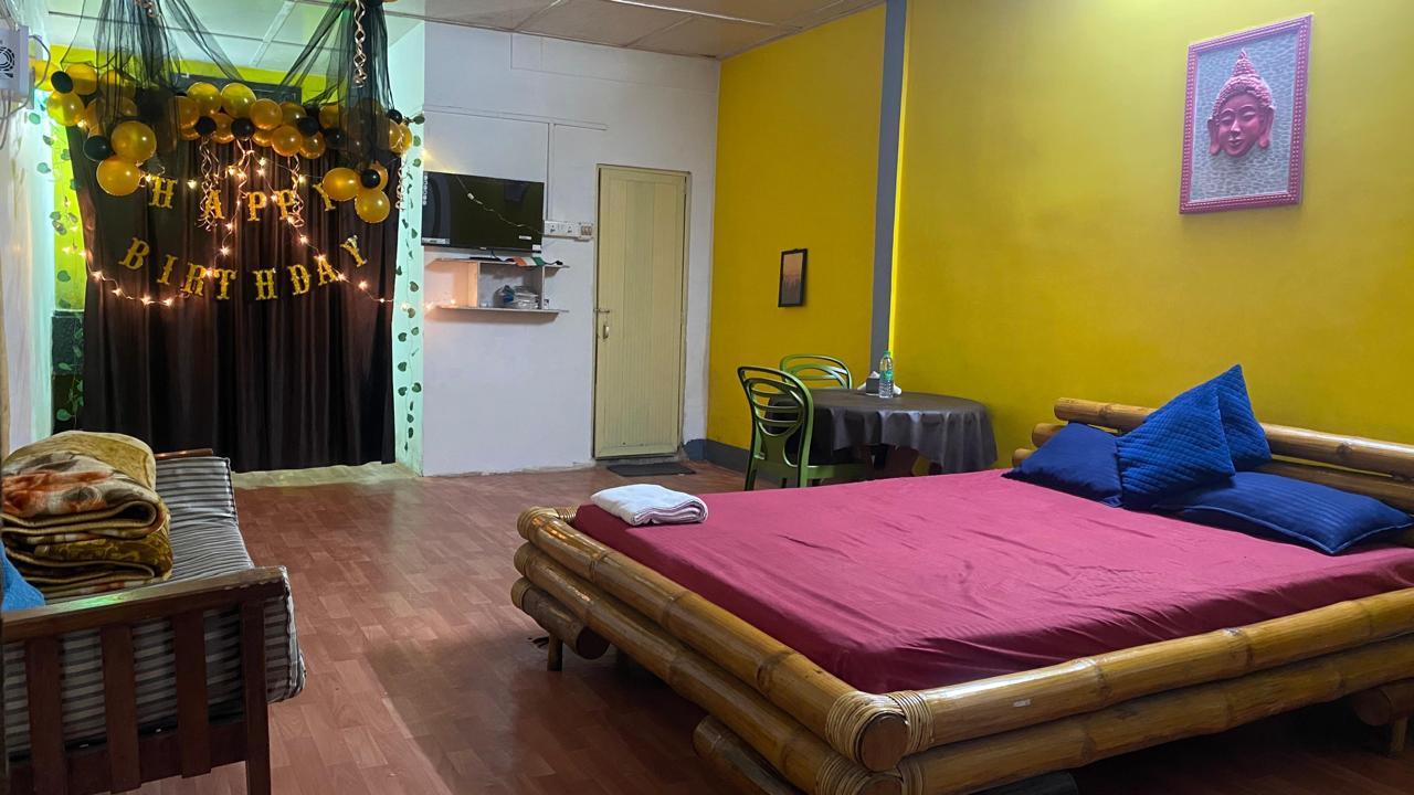 Family room with bamboo bed and birthday decorations